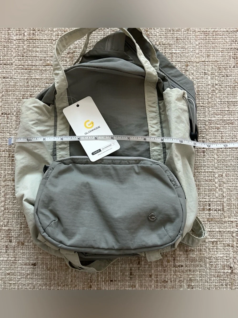 Glowmode gray backpack with detachable pouch and separate zip strap